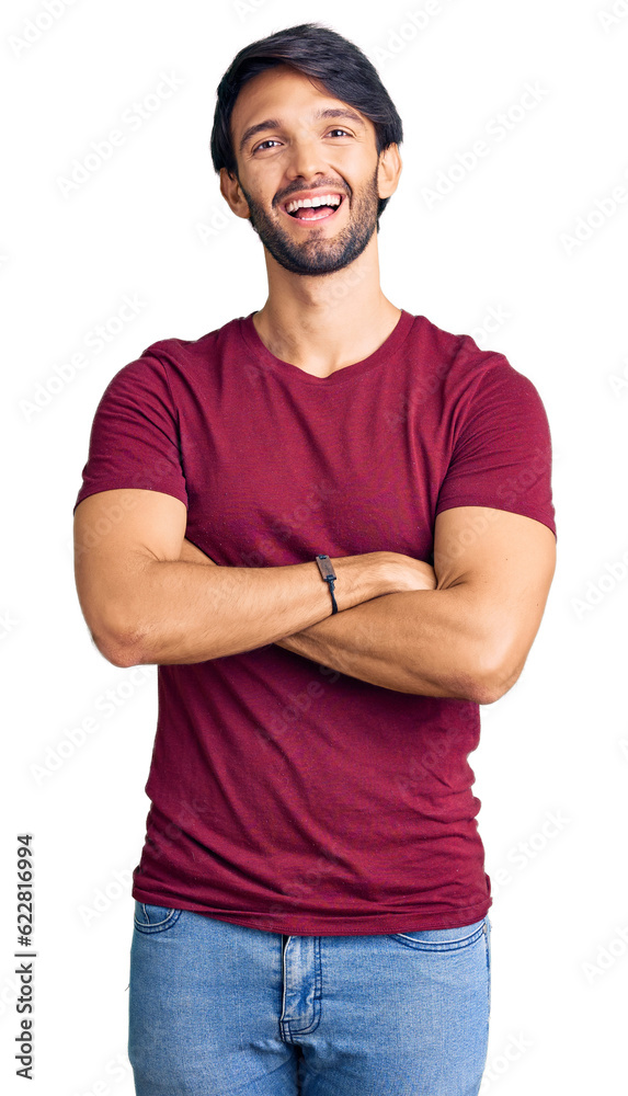 Fototapeta premium Handsome hispanic man wearing casual clothes happy face smiling with crossed arms looking at the camera. positive person.