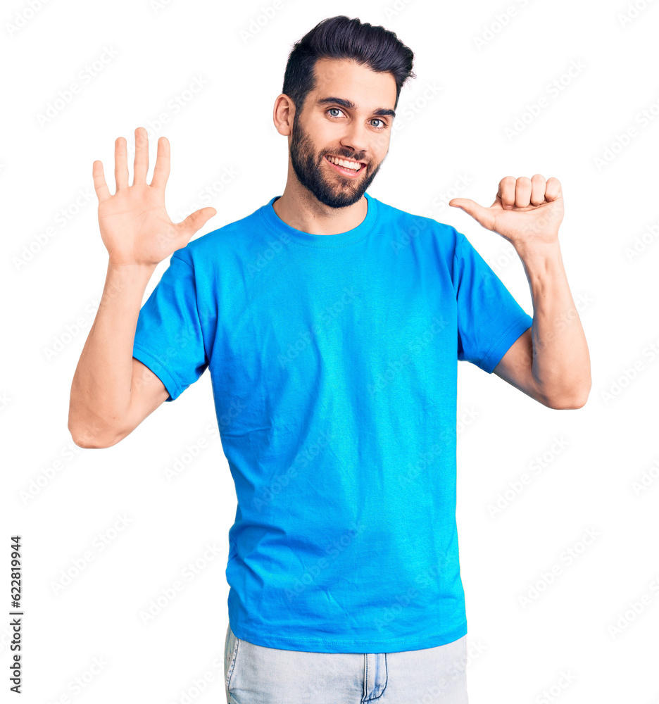 Young handsome man with beard wearing casual t-shirt showing and pointing up with fingers number six while smiling confident and happy. Young handsome man with beard wearing casual t-shirt showing and pointing up with fingers number six while smiling confident and happy.