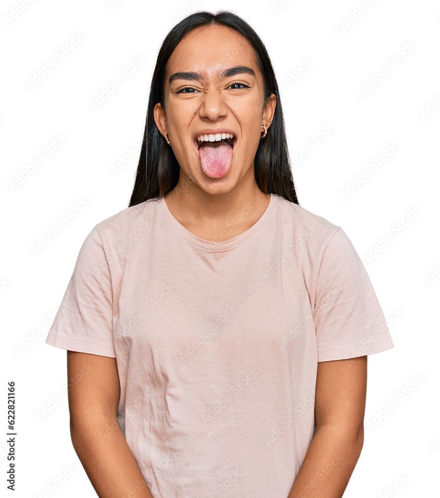 Young asian woman wearing casual clothes sticking tongue out happy with funny expression. emotion concept. Young asian woman wearing casual clothes sticking tongue out happy with funny expression. emotion concept.