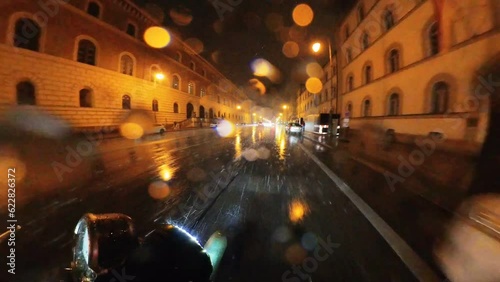 Night riding naked motorcycle bike during rain through the Munich city centre, Germany – 360 degree effect – video and audio