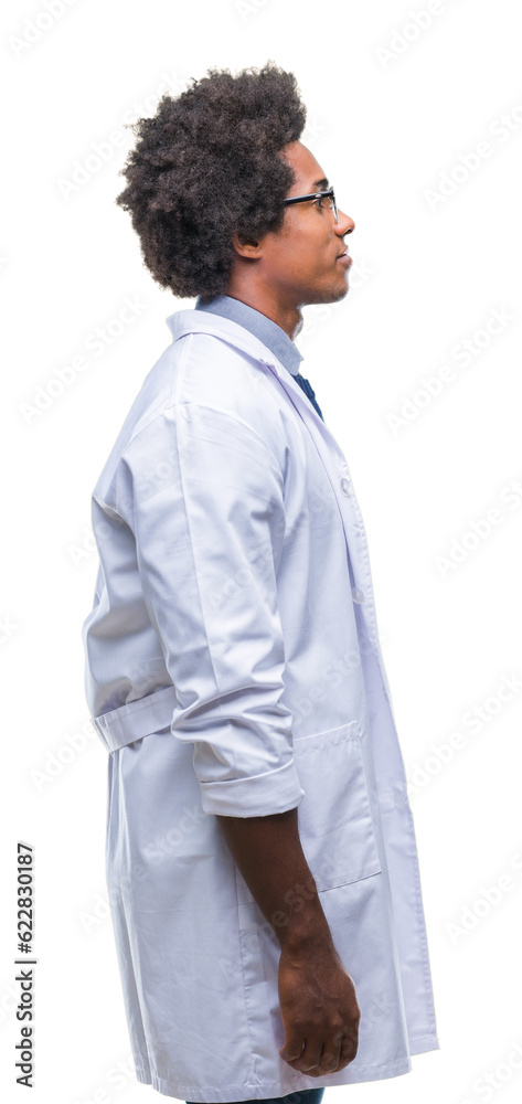 Afro american doctor scientist man over isolated background looking to side, relax profile pose with natural face with confident smile. Afro american doctor scientist man over isolated background looking to side, relax profile pose with natural face with confident smile.