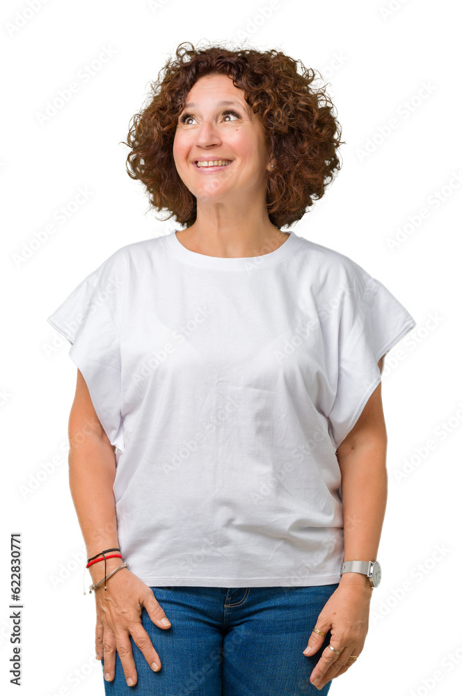 Beautiful middle ager senior woman wearing white t-shirt over isolated background smiling looking side and staring away thinking. Beautiful middle ager senior woman wearing white t-shirt over isolated background smiling looking side and staring away thinking.