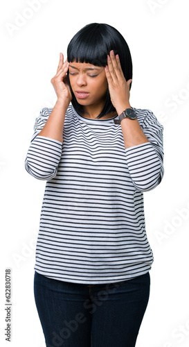 Beautiful young african american woman wearing stripes sweater over isolated background with hand on head for pain in head because stress. Suffering migraine.