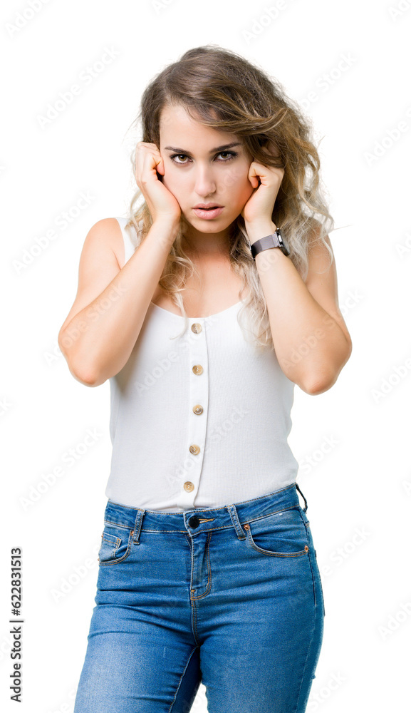 Young beautiful blonde woman over isolated background covering ears with fingers with annoyed expression for the noise of loud music. Deaf concept. Young beautiful blonde woman over isolated background covering ears with fingers with annoyed expression for the noise of loud music. Deaf concept.