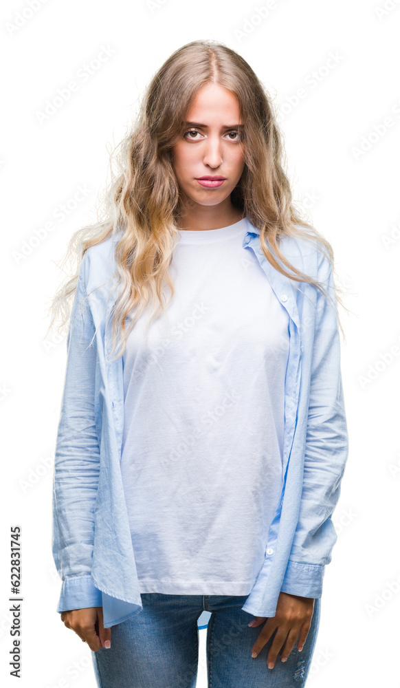 Beautiful young blonde woman over isolated background depressed and worry for distress, crying angry and afraid. Sad expression. Beautiful young blonde woman over isolated background depressed and worry for distress, crying angry and afraid. Sad expression.