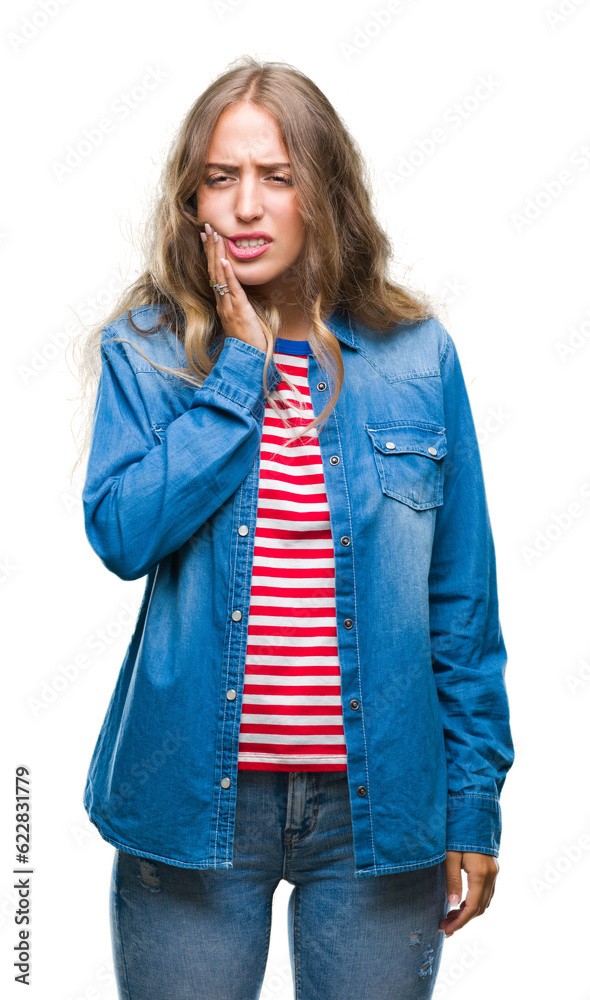 Beautiful young blonde woman over isolated background touching mouth with hand with painful expression because of toothache or dental illness on teeth. Dentist concept. Beautiful young blonde woman over isolated background touching mouth with hand with painful expression because of toothache or dental illness on teeth. Dentist concept.