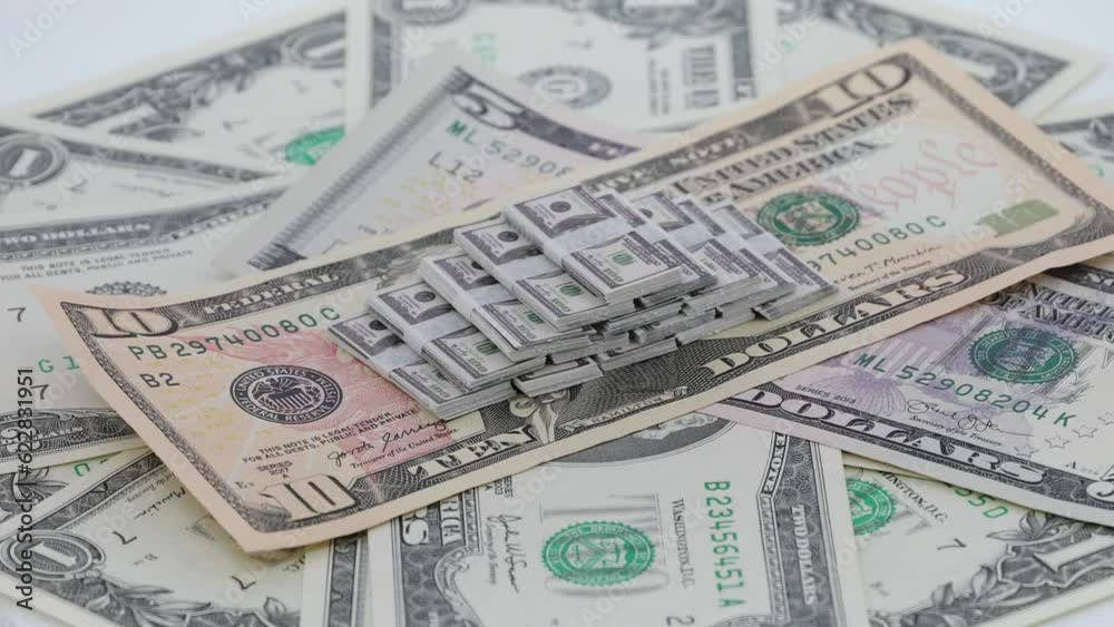 Bundle of America bills, spinning dollars, USD Bundle of America bills, spinning dollars, USD