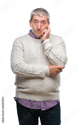 Handsome senior man wearing winter sweater over isolated background thinking looking tired and bored with depression problems with crossed arms.