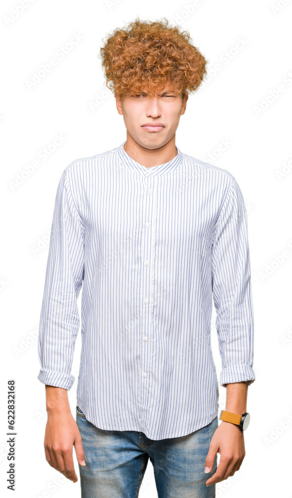 Young handsome business man with afro hair wearing elegant shirt depressed and worry for distress, crying angry and afraid. Sad expression. Young handsome business man with afro hair wearing elegant shirt depressed and worry for distress, crying angry and afraid. Sad expression.