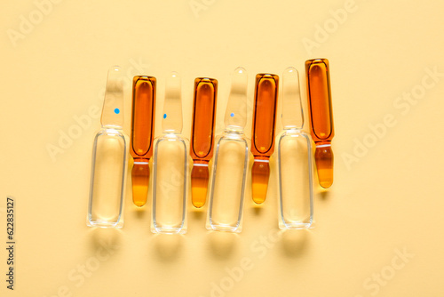Glass medical ampules on li...
