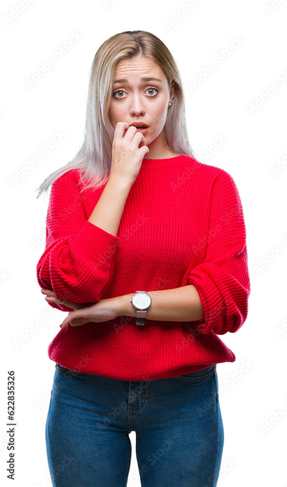 Young blonde woman wearing winter sweater over isolated background looking stressed and nervous with hands on mouth biting nails. Anxiety problem. Young blonde woman wearing winter sweater over isolated background looking stressed and nervous with hands on mouth biting nails. Anxiety problem.