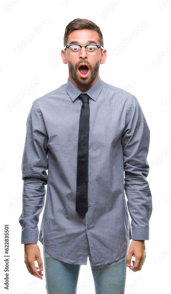 Young handsome business man over isolated background afraid and shocked with surprise expression, fear and excited face. Young handsome business man over isolated background afraid and shocked with surprise expression, fear and excited face.