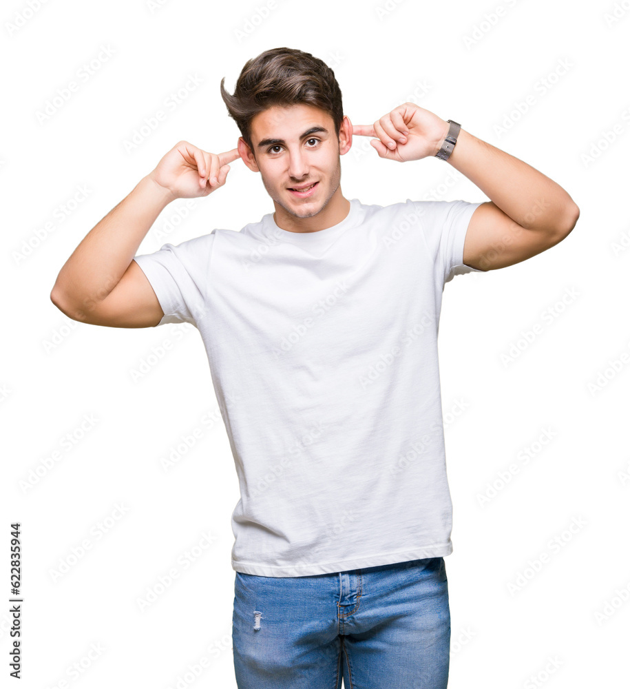 Young handsome man wearing white t-shirt over isolated background Smiling pulling ears with fingers, funny gesture. Audition problem Young handsome man wearing white t-shirt over isolated background Smiling pulling ears with fingers, funny gesture. Audition problem