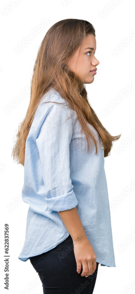 Young beautiful brunette business woman over isolated background looking to side, relax profile pose with natural face with confident smile. Young beautiful brunette business woman over isolated background looking to side, relax profile pose with natural face with confident smile.