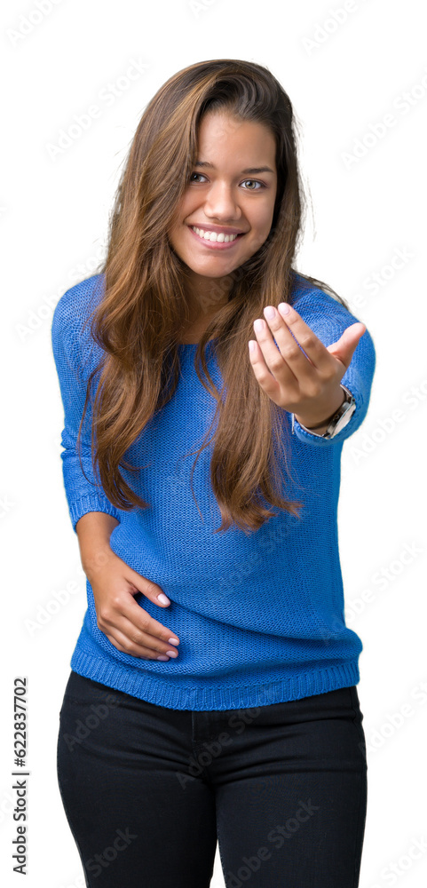 Young beautiful brunette woman wearing blue sweater over isolated background Beckoning come here gesture with hand inviting happy and smiling Young beautiful brunette woman wearing blue sweater over isolated background Beckoning come here gesture with hand inviting happy and smiling