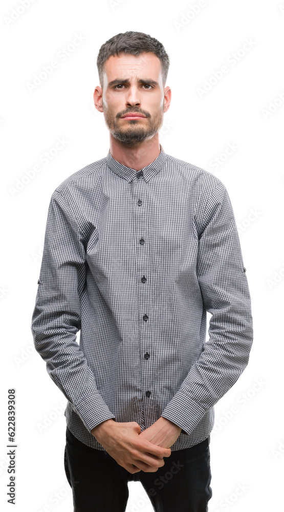 Young hipster man depressed and worry for distress, crying angry and afraid. Sad expression. Young hipster man depressed and worry for distress, crying angry and afraid. Sad expression.