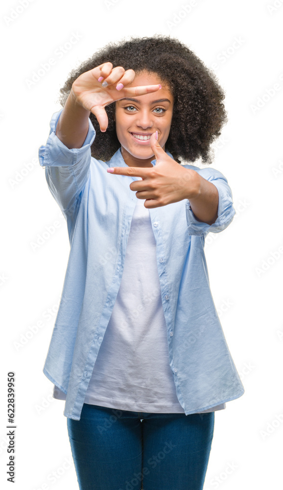 Young afro american woman over isolated background smiling making frame with hands and fingers with happy face. Creativity and photography concept. Young afro american woman over isolated background smiling making frame with hands and fingers with happy face. Creativity and photography concept.