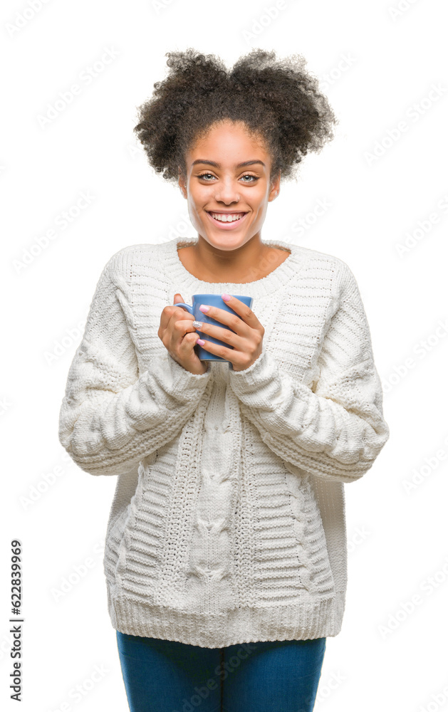Young afro american woman driking cup of coffee over isolated background with a happy face standing and smiling with a confident smile showing teeth Young afro american woman driking cup of coffee over isolated background with a happy face standing and smiling with a confident smile showing teeth