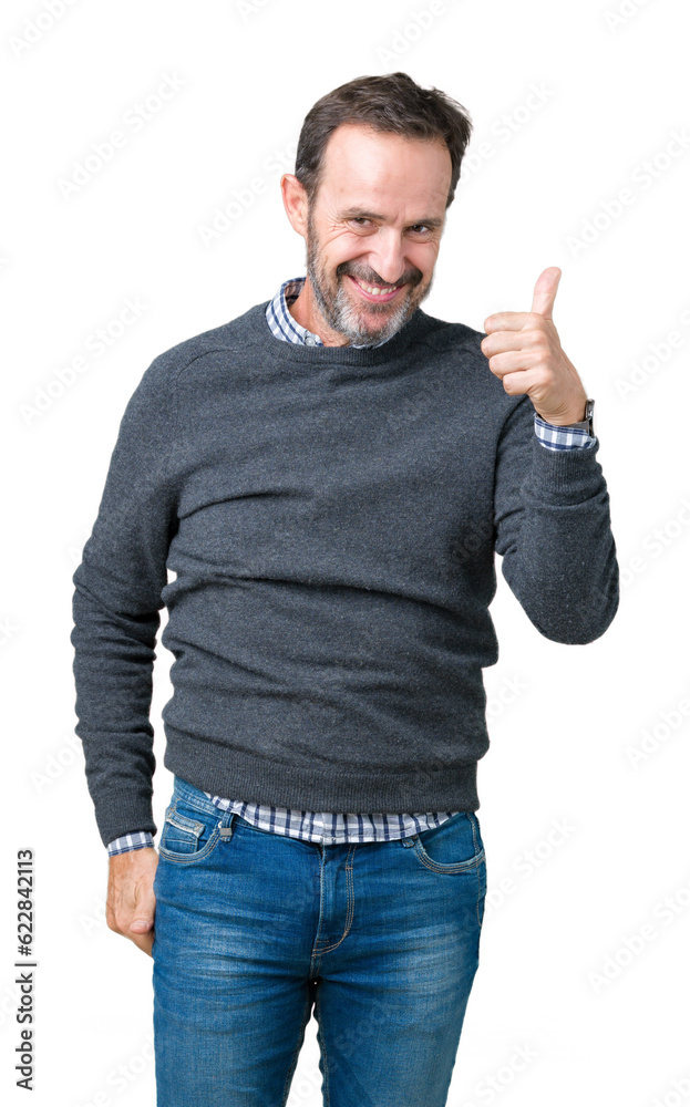 Handsome middle age senior man wearing a sweater over isolated background doing happy thumbs up gesture with hand. Approving expression looking at the camera showing success. Handsome middle age senior man wearing a sweater over isolated background doing happy thumbs up gesture with hand. Approving expression looking at the camera showing success.