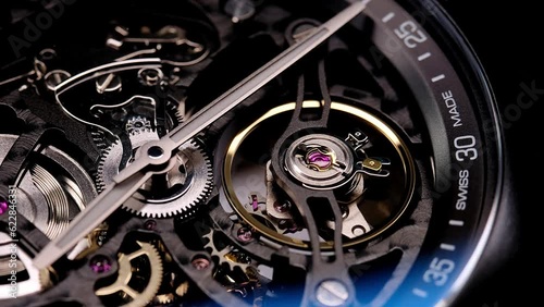 gear drive motion in skeleton watch. Mechanical watches with gears and cogs. Watch or clock mechanism. Clockwork details and parts. Inside watch, mechanical watch in macro view. Macro Shot Clock Face