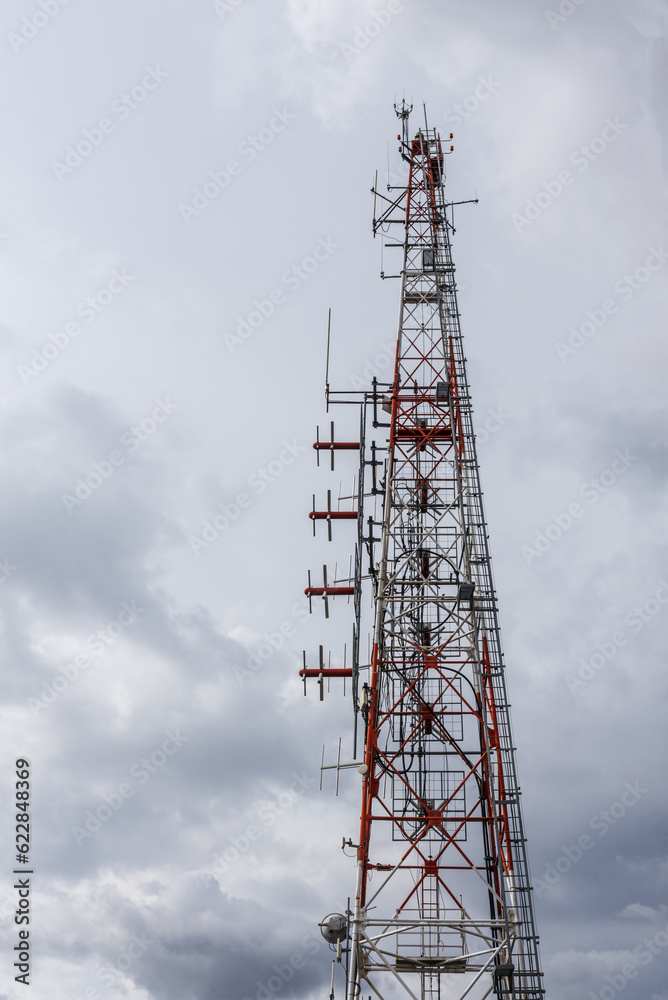 A tall telecommunication tower with antennas A tall telecommunication tower with antennas