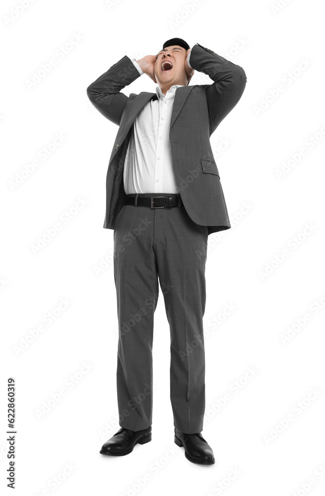 Businessman in suit screaming on white background, low angle view Businessman in suit screaming on white background, low angle view