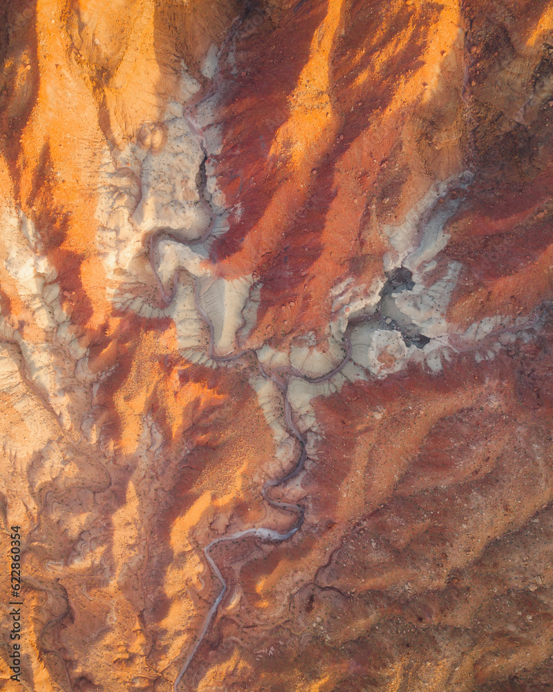 Aerial view of colorful rock textures, near Vermilion Cliffs National Monument, Marble Canyon, Arizona, United States. Aerial view of colorful rock textures, near Vermilion Cliffs National Monument, Marble Canyon, Arizona, United States.