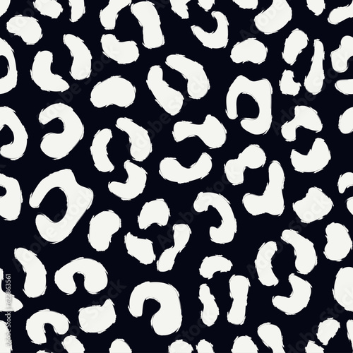 Animal skin print. Leopard seamless pattern. Natural wildlife camouflage texture. Repeating spots motif. Hand drawn background