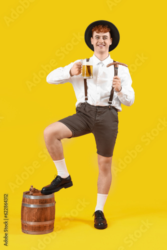 Smiling young man in tradit...