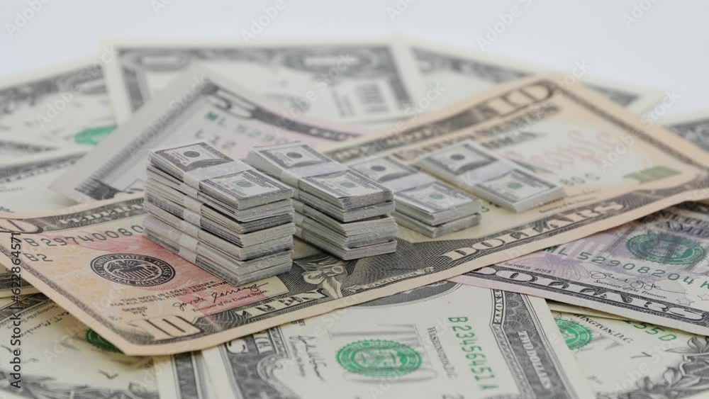 Bundle of America bills, spinning dollars, USD Bundle of America bills, spinning dollars, USD