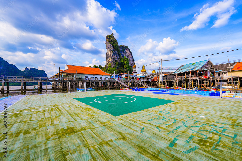 Floating soccer field in the fishing village of Koh Panyee made of houses on stilts in Phang Nga Bay, Andaman Sea, Thailand