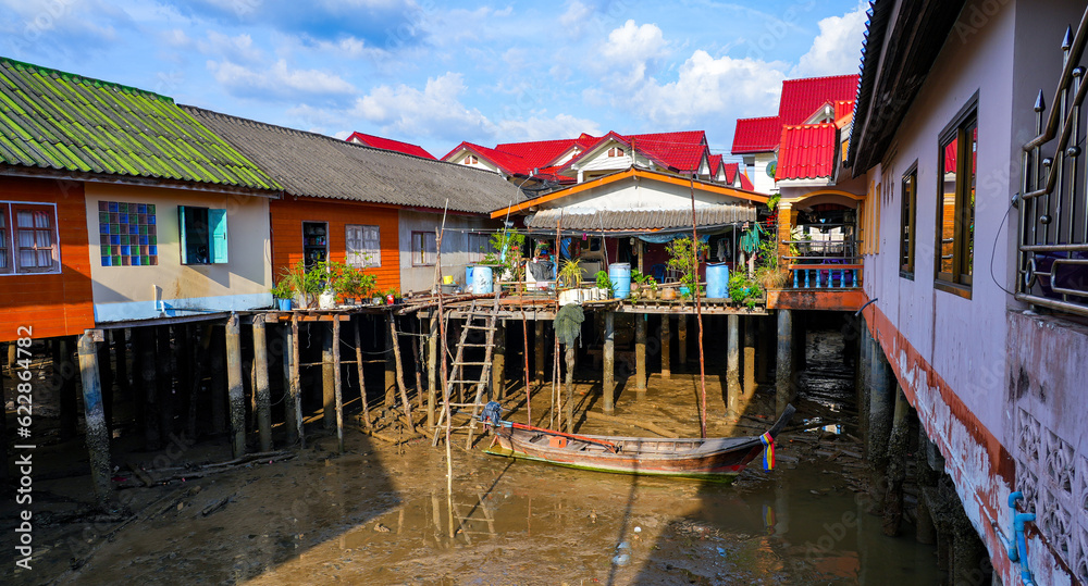Houses on stilts in the floating fishing village of Koh Panyee, suspended over the waters of the Andaman Sea in the Phang Nga Bay, Thailand