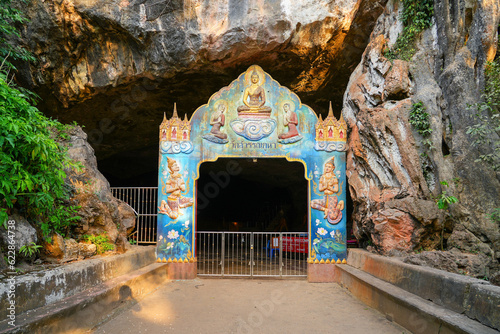Entrance of the Wat Suwan Kuha (cave temple) in the Phang Nga province of Thailand photo