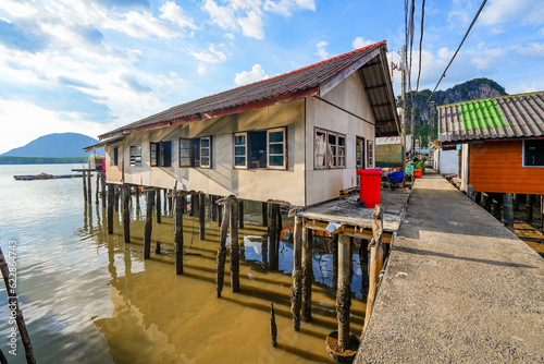 Houses on stilts in the floating fishing village of Koh Panyee  suspended over the waters of the Andaman Sea in the Phang Nga Bay  Thailand
