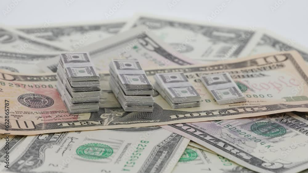 Bundle of America bills, spinning dollars, USD Bundle of America bills, spinning dollars, USD