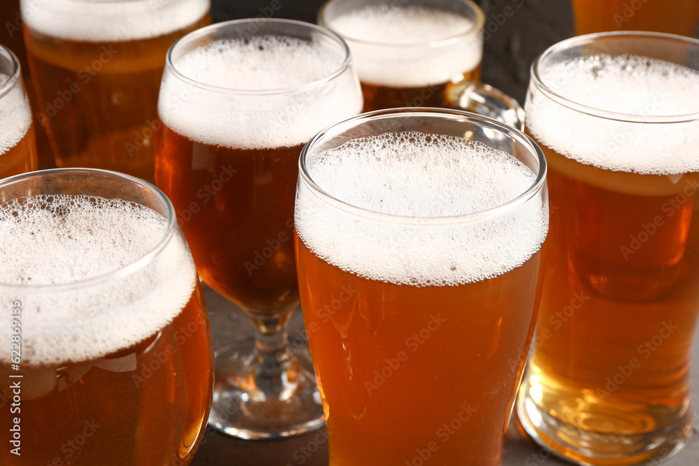 Glasses of cold beer on black background. Oktoberfest celebration Glasses of cold beer on black background. Oktoberfest celebration