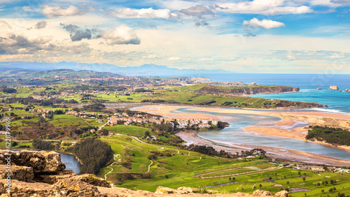Panoramic and high-altitude view from Monte La Picota of the estuary and beach of Mogro, Cantabria, Spain photo