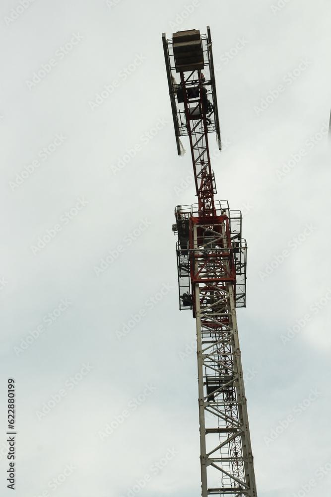 Photo of gondola construction being used to build a tall building Photo of gondola construction being used to build a tall building