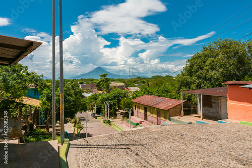 View of the Momotombo volcano, from Nagarote. Streets of Nagarote with a view of the momotombo volcano on a beautiful day photo