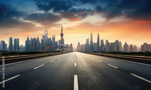 Empty asphalt road and city skyline with buildings at sunset in Shanghai.