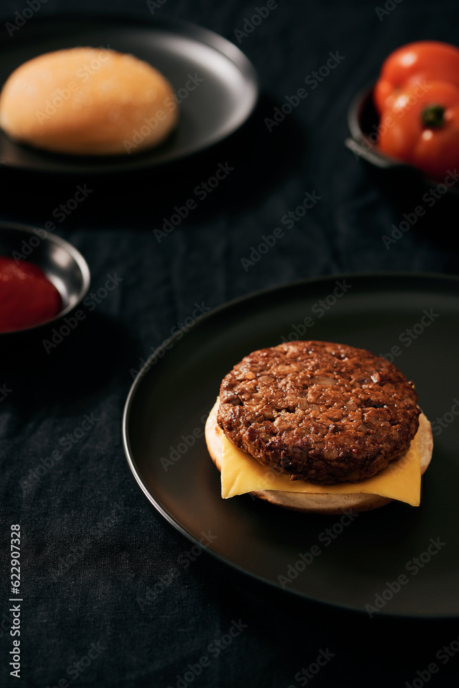 Process making of burger, step by step isolated on black background. Burger wide banner. Split burger. Burger divided in parts Process making of burger, step by step isolated on black background. Burger wide banner. Split burger. Burger divided in parts