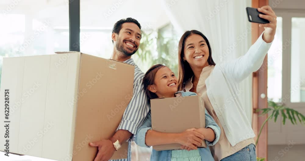 Parents, child and selfie for moving, boxes and memory in family house for post, social network app or blog. Happy father, mother and daughter with smile, profile picture and photography in new home Parents, child and selfie for moving, boxes and memory in family house for post, social network app or blog. Happy father, mother and daughter with smile, profile picture and photography in new home