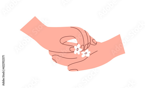 Two fonding hands touching with sensuality. Holding tender flowers. Love, sup...
