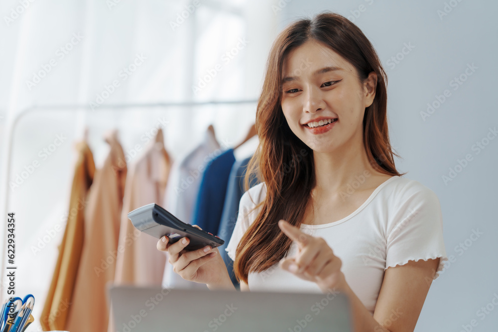 How To Start A Clothing Store Online Business apparel! Young confident asian female fashion owner social media influencer Live selling clothes, new products at home office small business e-commerce. How To Start A Clothing Store Online Business apparel! Young confident asian female fashion owner social media influencer Live selling clothes, new products at home office small business e-commerce.