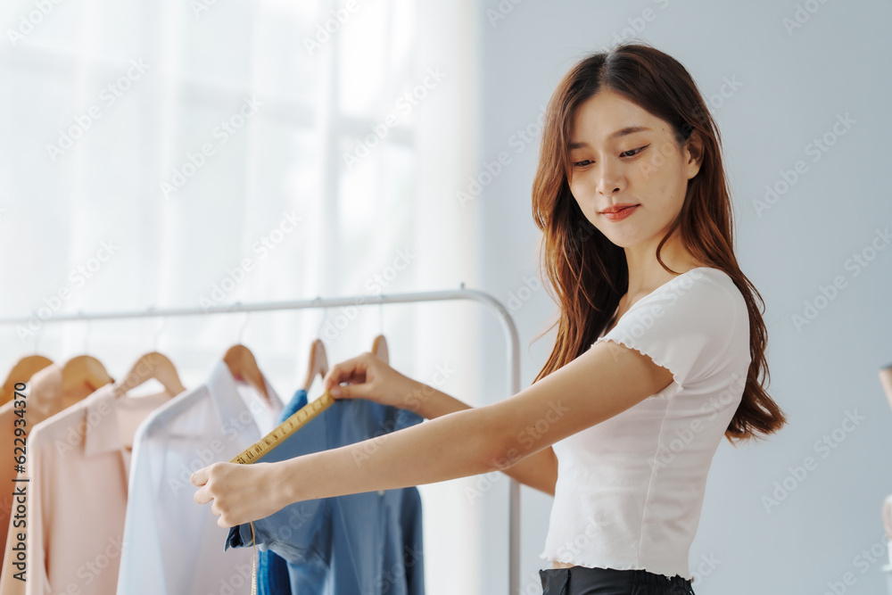 How To Start A Clothing Store Online Business apparel! Young confident asian female fashion owner social media influencer Live selling clothes, new products at home office small business e-commerce. How To Start A Clothing Store Online Business apparel! Young confident asian female fashion owner social media influencer Live selling clothes, new products at home office small business e-commerce.