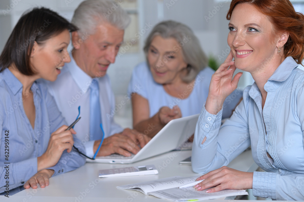 business people working at desk in office business people working at desk in office