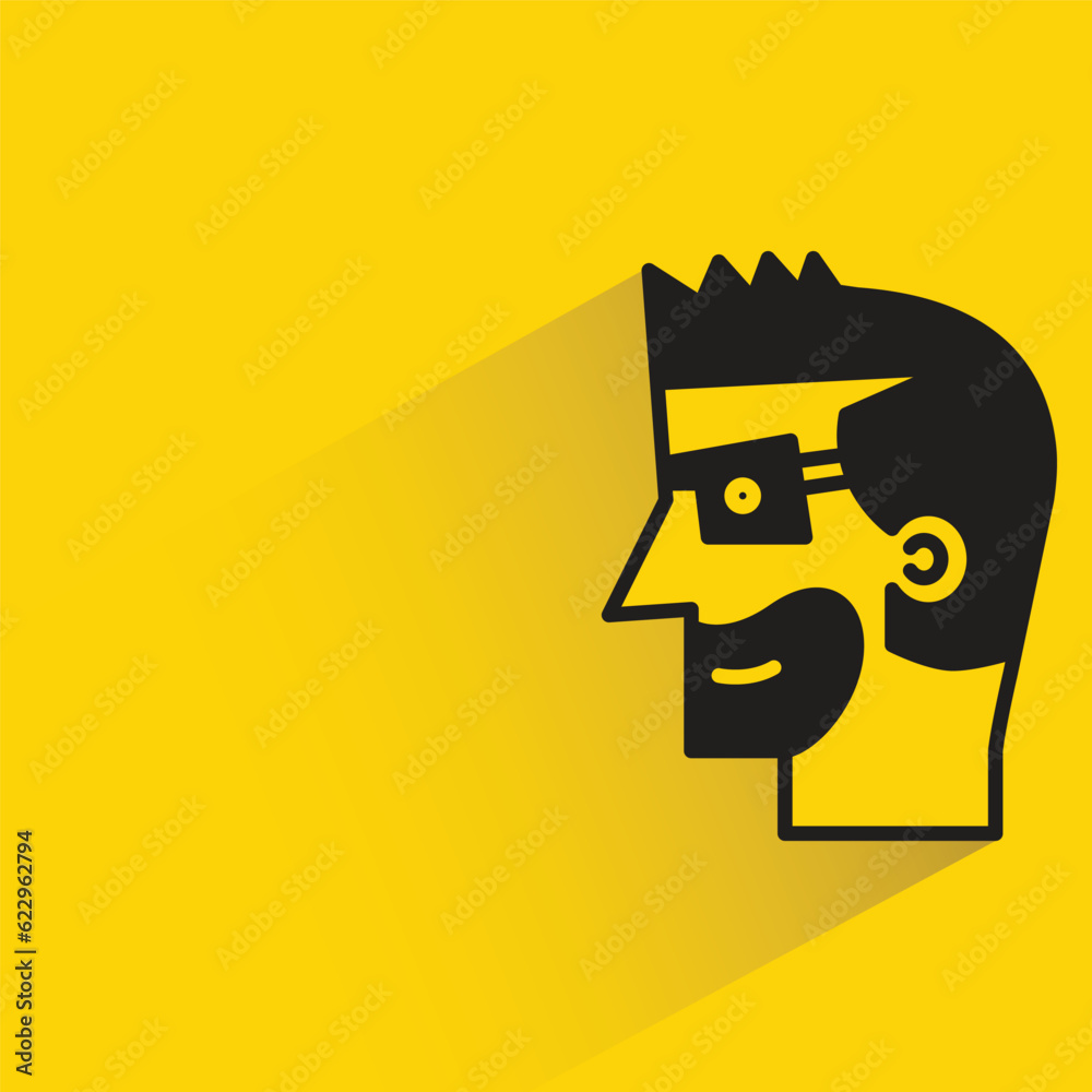 man with shadow on yellow background man with shadow on yellow background