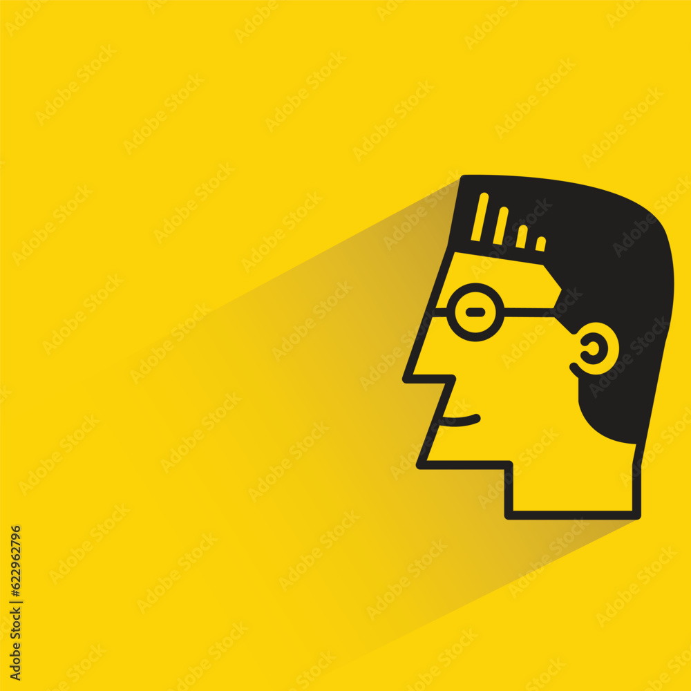 man with shadow on yellow background man with shadow on yellow background