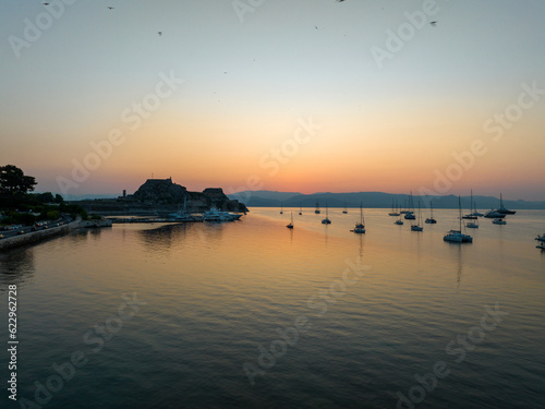 Corfu, Greece. Picturesque Garitsa bay at sunrise. photo