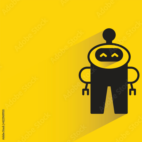 cute robot with shadow on yellow background